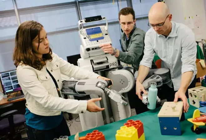 Chelsea Finn is teaching Brett the Robot how the world works