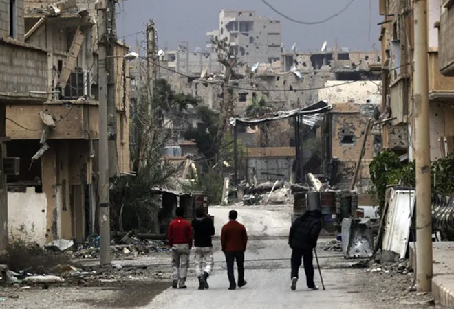 Economic crisis and infighting within the Assad family envelopes war-ravaged Syria   
