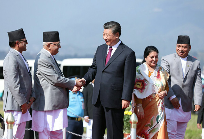 President Xi shaking hands with PM Oli